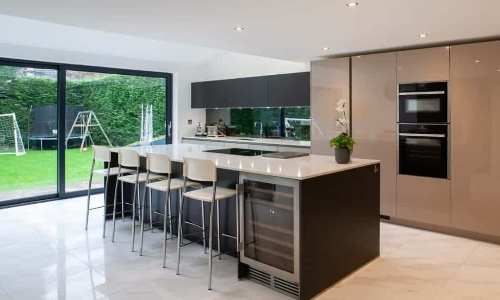 Top 7 Summer Trends For Your Leeds Fitted Kitchen Modern Kitchen With Island and Glossy Finish